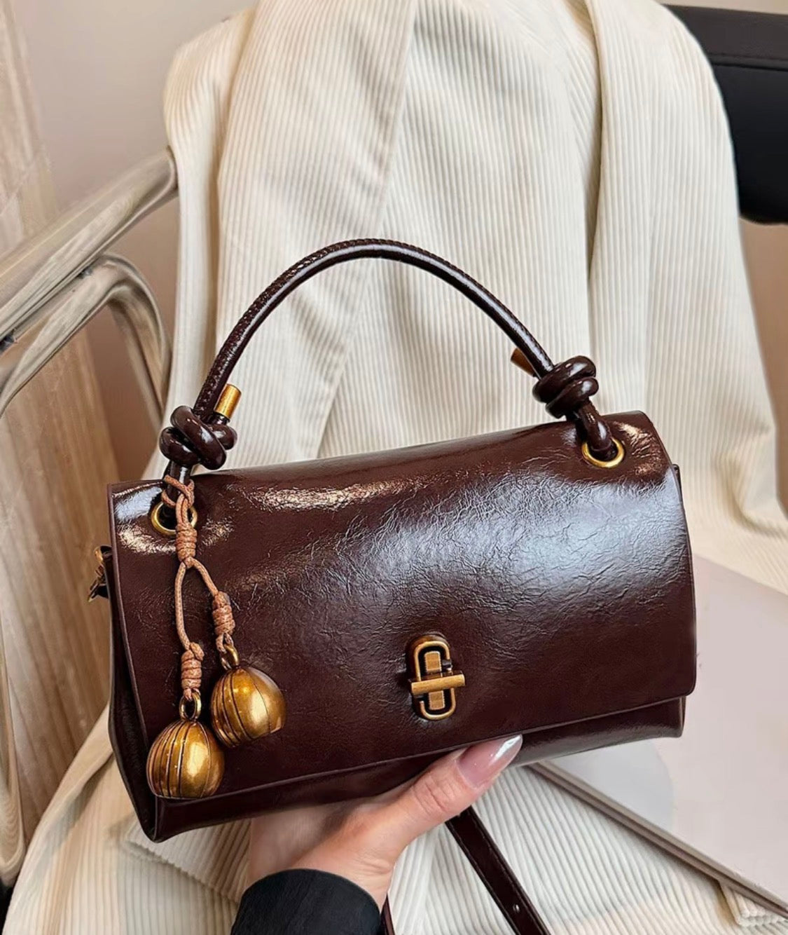 Brown Bag with Gold Charm